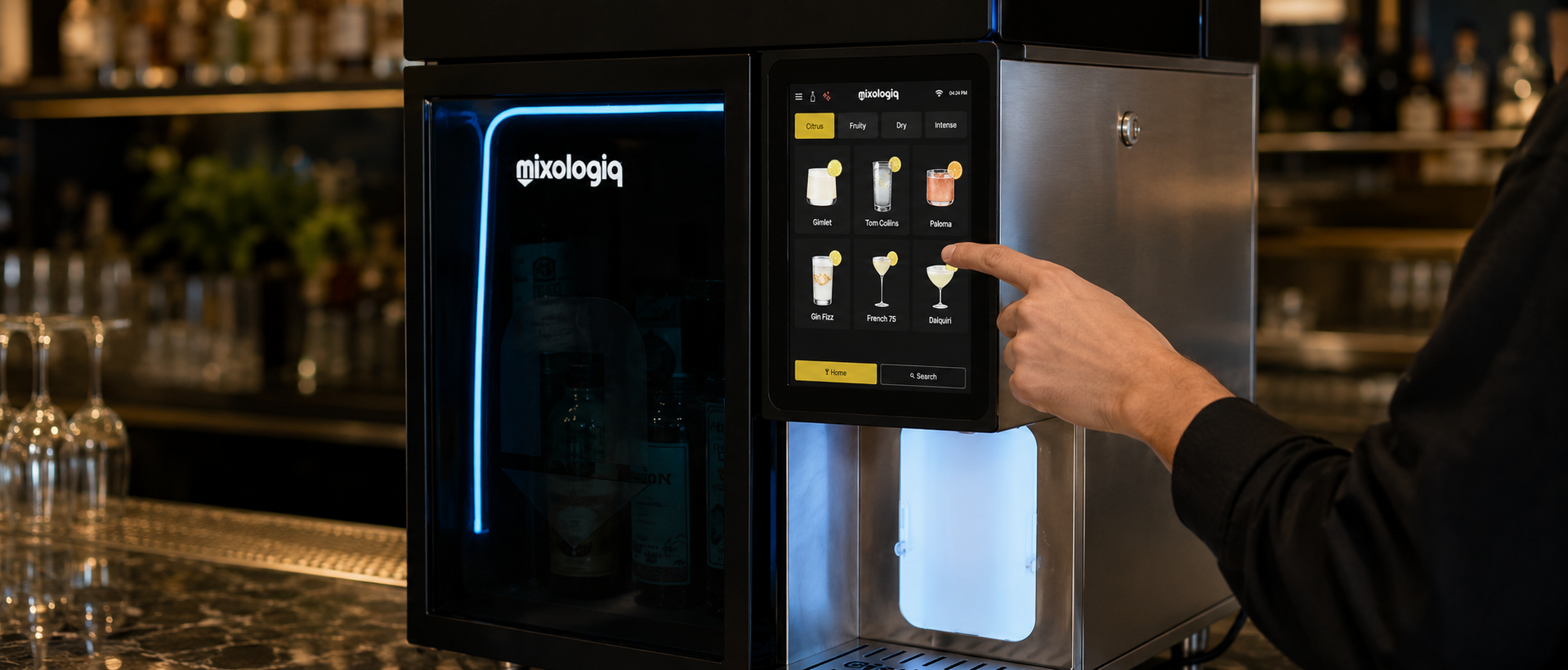 Hospitality operator using the Mixo 20 touchscreen to select cocktails organised by flavour profile